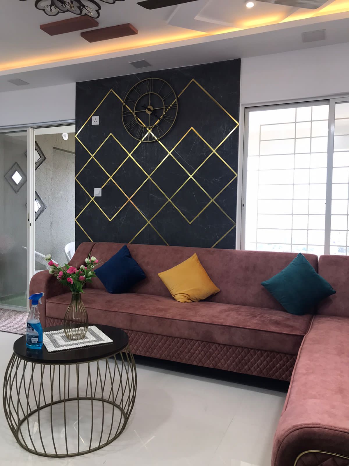 Living room with accent wall and false ceiling by Artmarque, Dhayri Pune